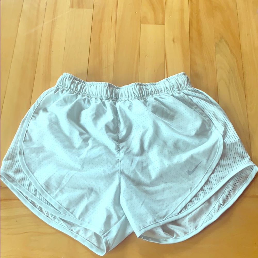 Teal Dri-Fit Nike shorts.